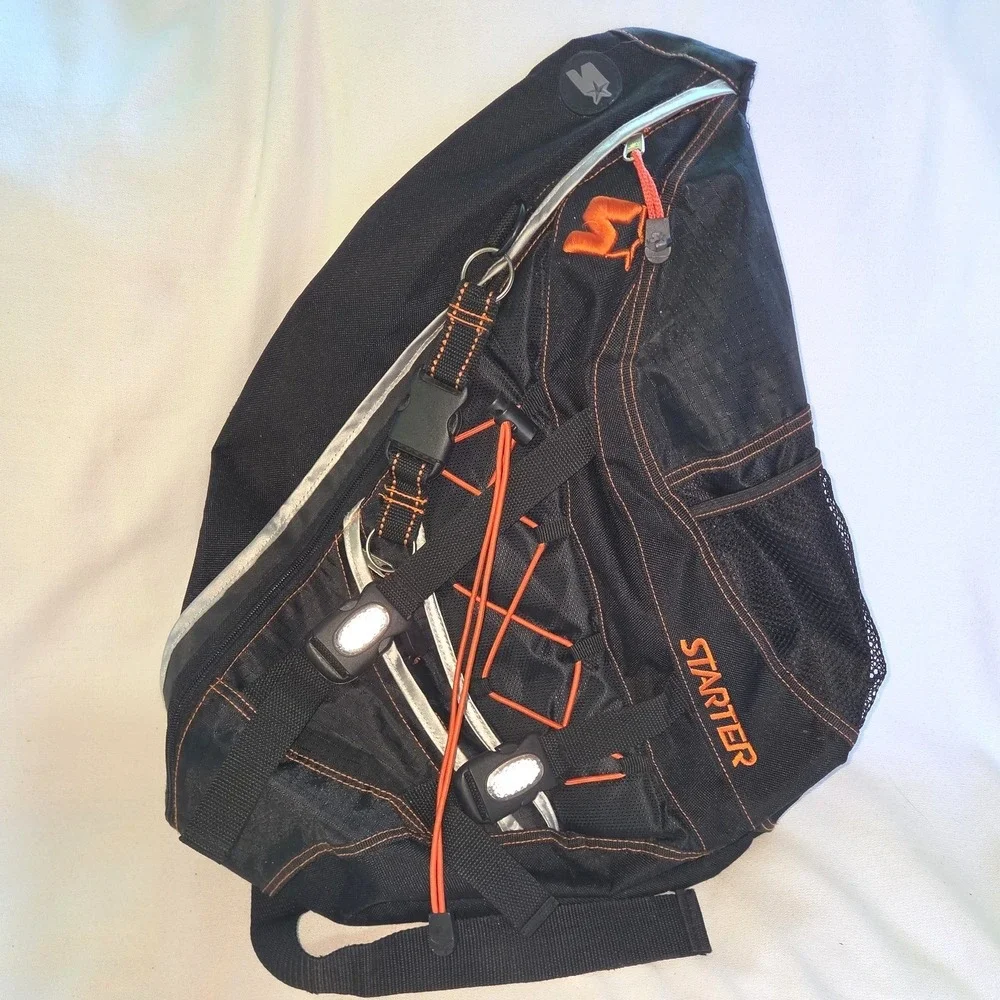 Starter Sling Backpack Black Reflective Orange Stitch Bungee Bag